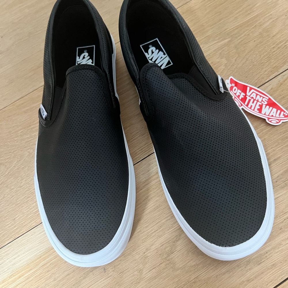 Vans Black and White Slip-On Sneakers